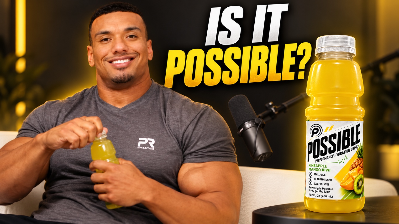 Is it Possible? A man holding a POSSIBLE bottle beside a studio microphone and a large Pineapple Mango Kiwi bottle